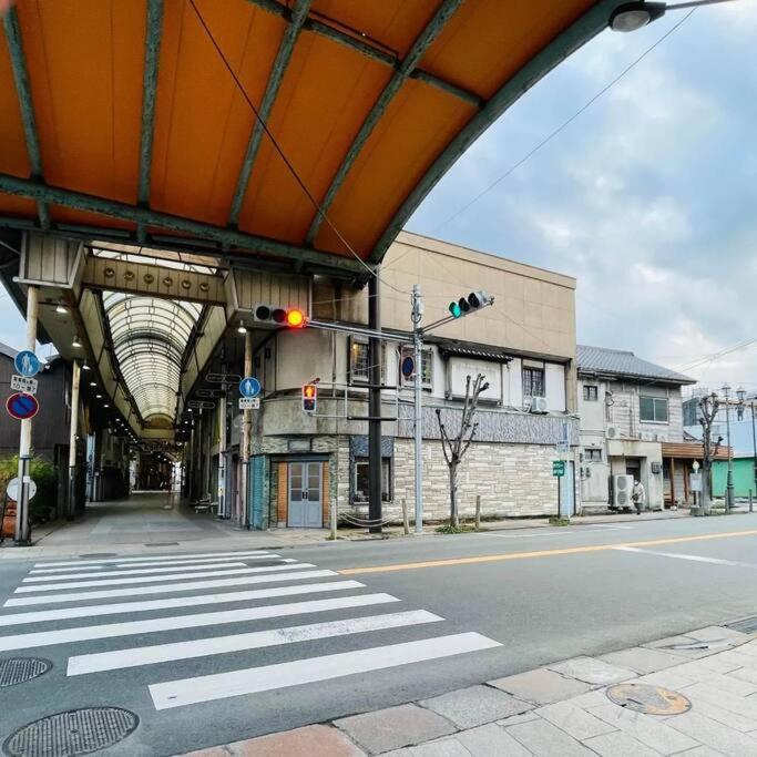 Nogataの商店街の一角にあるちいさな隠れ家　忘覚庵 Apartment *